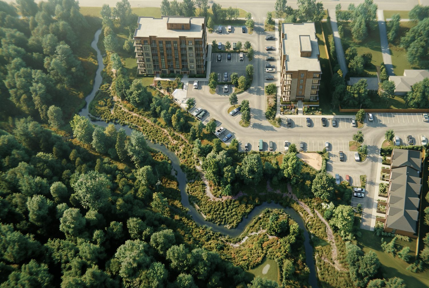 Aerial rendering of the Ingersoll site: two mid-rise apartment buildings with parking at the top, and a creek winding through dense woodland and conservation land below.